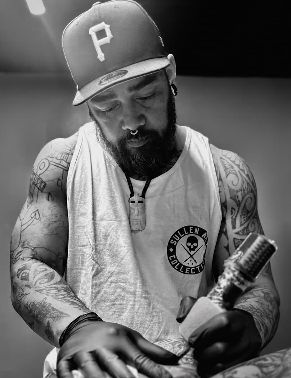 Wuki Purcell tattooing